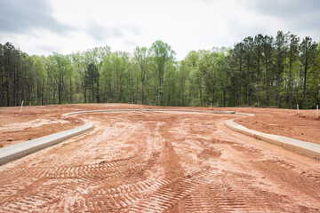 New home residential subdivision development of roads and curbs - obrazy, fototapety, plakaty