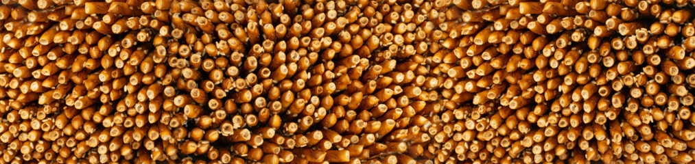 Pretzel Sticks Texture Background, Crunchy Breadsticks Pattern with Copy Space, Grissini Banner
