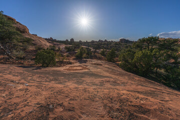 hiking the broken arch trail in arches national park, utah, usa