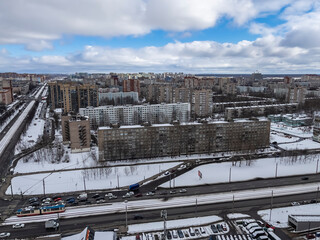St. Petersburg, Russia, January 4, 2023. Crosswalk and multi-storey modern residential building at winter 