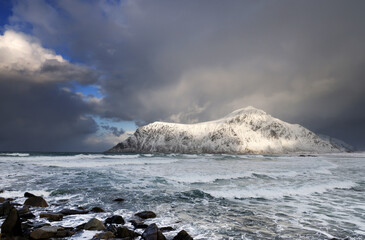 Waves on coast of Norwegian sea on Skagsanden beach, Flakstad, Lofoten islands, Norway, Europe
