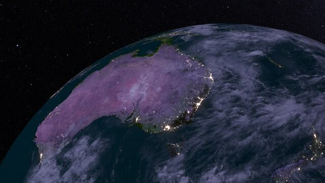 The Earth rotating animation. Close up Nightly Australian continent , NewHolland with galaxy stars. Elements of this image furnished by NASA.