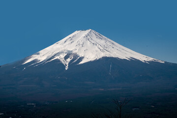 snow capped mount fujijama in Japan under blue sky