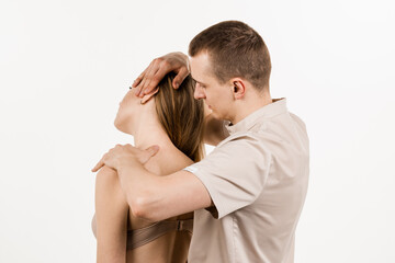 Manual therapy at physiotherapist or chiropractor. Orthopedist examining female neck and head....