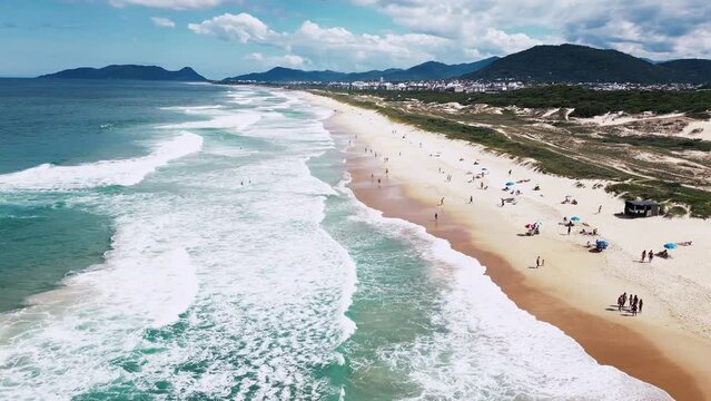Aerial view of the beach in Brazil and Atlantic Ocean with rolling waves