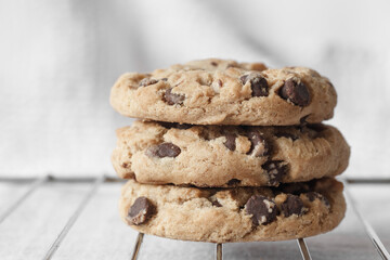 Stacked chocolate chip cookies with copy space