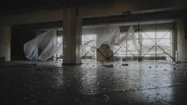Destroyed house of culture, broken windows as a result of bombings. 2022