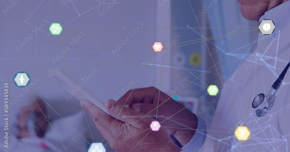 Wall mural Animation of network of connections with icons over caucasian male doctor using tablet