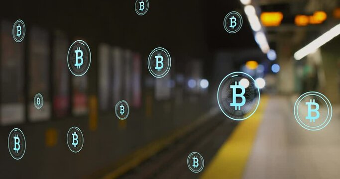 Animation of multiple bitcoin symbols floating against blurred view of train arriving at a station