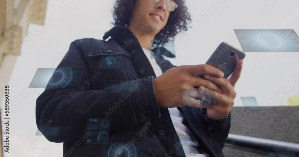 Poster animation of radars and loading circles over low angle view of biracial man using cellphone