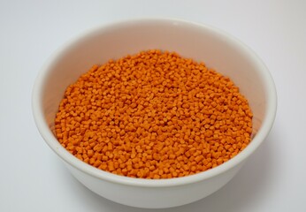Orange pigment. Used for mixing with plastic pellets in production.