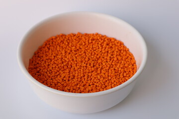 Orange pigment. Used for mixing with plastic pellets in production.