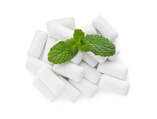 Heap of chewing gum pieces and mint on white background, top view