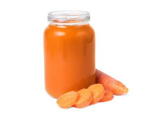 Jar of healthy baby food and carrot slices on white background