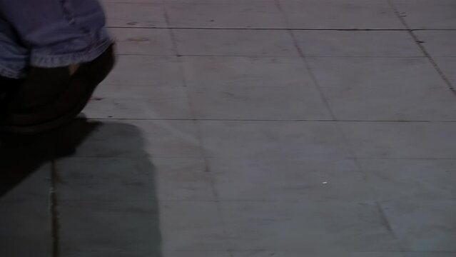 People Dancing Tango at a Milonga or Nightclub in Corrientes Province, Argentina. Low Angle View.  