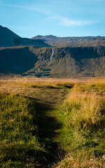Trail leading up to Bjarnarfoss waterfall in western Iceland