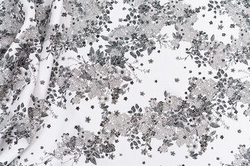 Collection of fashionable fabrics. Samples of different natural fabrics for sewing a fashion collection of clothes. Large selection of fabrics in the store or tailor warehouse.