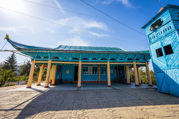 Wooden historical building of Dungan mosque in Karakol, Kyrgyzstan - 589367879