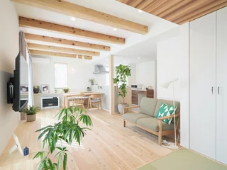 Fotobehang Japandi Bright and airy Japandi style living room with sofa and ceiling beams  © kumataka