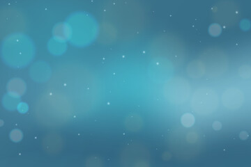 bokeh lights on a pastel blue abstract background