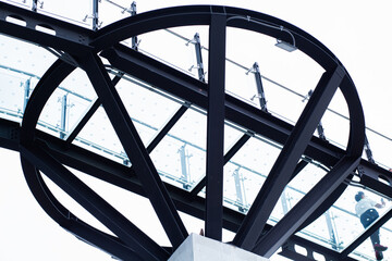 An elevated bridge with a clear background is a tourist attraction.