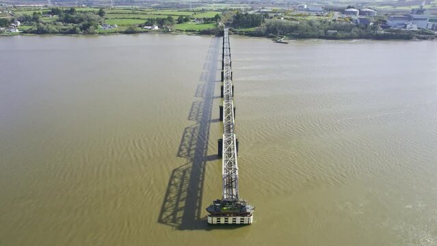 Barrow Railway bridge waterford Estuary aerial reveal of the bridge with a span open to allow shipping up the Barrow River to New Ross and beyond