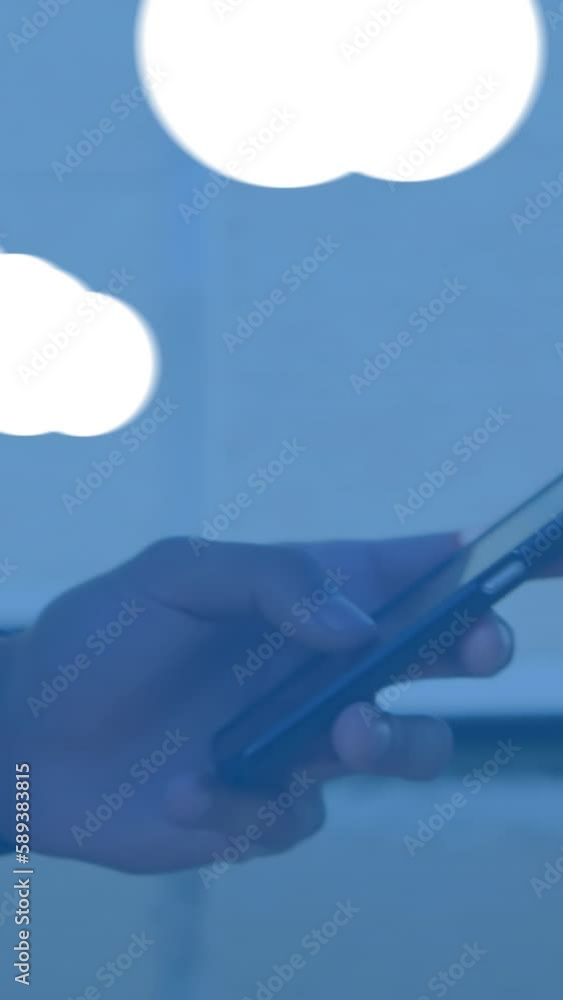Poster animation of clouds with electronic devices over caucasian man using smartphone