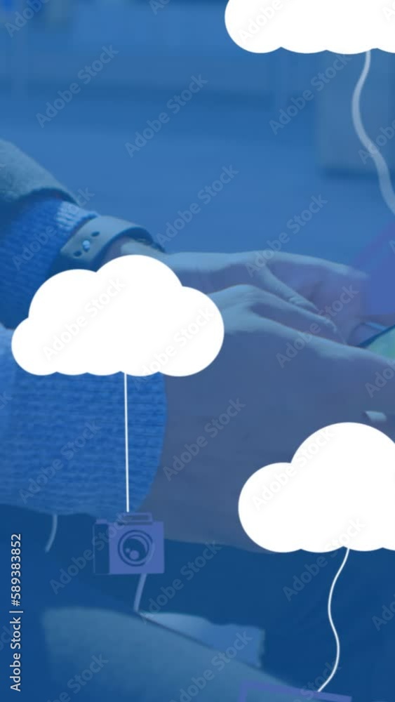 Poster animation of clouds with electronic devices over caucasian businessman using smartphone