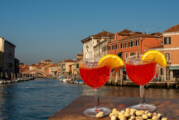 spritz for two in Venice with canal and traditional houses