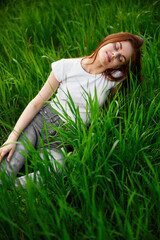 beautiful woman in casual clothes spends weekend in nature