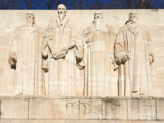 statues of Geneva reformation founders wall in swiss city