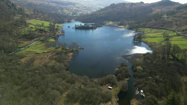 Rydal Water expansive view with River Rothay outlet in the English Lake District Cumbria
