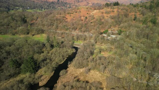 Flying over the River Rothay and the end of Rydal Water in Springtime in the English Lake District Cumbria