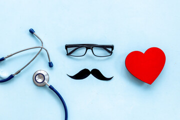 Black glasses with a mustache and stethoscope. Mans health concept