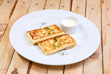 stuffed pancakes with sour cream