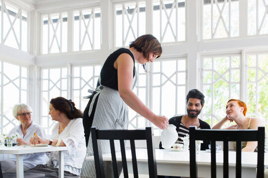 Hotel Guests Eating Breakfast