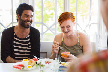 Couple eating breakfast