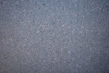 Background from polished granite slab. Gray granite texture, granite surface and background. Material for interior decoration.