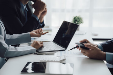 business adviser meeting to analyze and discuss the situation on the financial report in the...