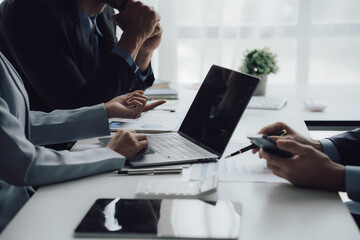 business adviser meeting to analyze and discuss the situation on the financial report in the meeting room.Investment Consultant, Financial advisor and accounting concept