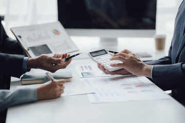 business adviser meeting to analyze and discuss the situation on the financial report in the meeting room.Investment Consultant, Financial advisor and accounting concept