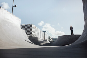 Man skateboarding in skate park