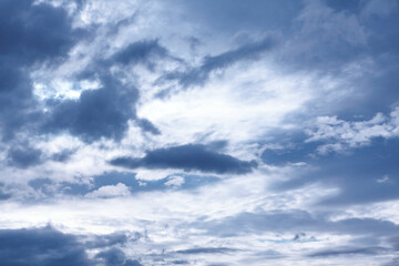 Grey gray clouds with glowing white clouds 