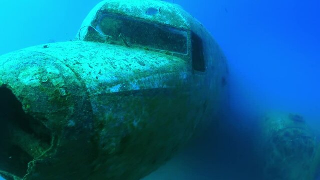 scuba diving into the wreck of a passenger plane.