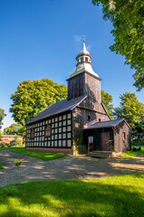 Fototapeta na wymiar The half-timbered church of Saint Lawrence in Strzeczona, Pomeranian Voivodeship, Poland