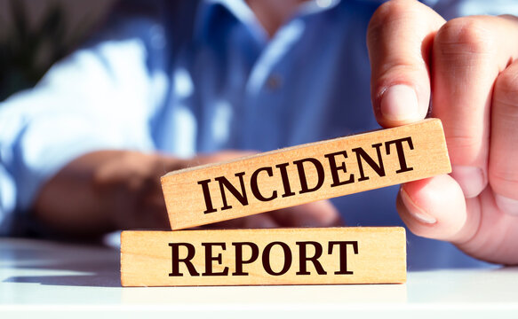 Wooden blocks with words 'Incident report'. Business concept