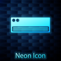 Glowing neon Air conditioner icon isolated on brick wall background. Split system air conditioning. Cool and cold climate control system. Vector
