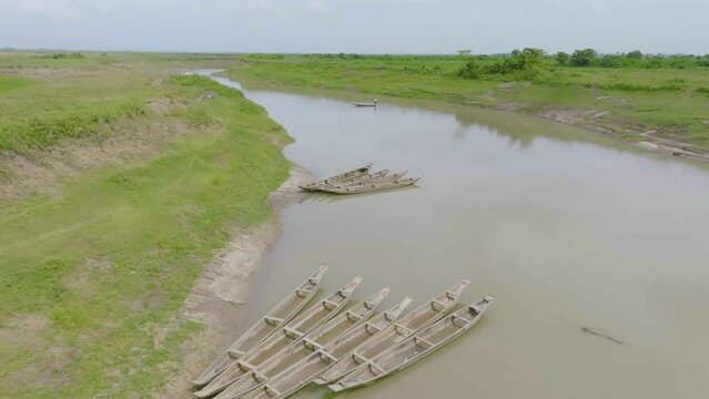 Aerial view of the river in the country, Boat on the river water, high quality 4k smooth video footage, sylhet, bangladesh