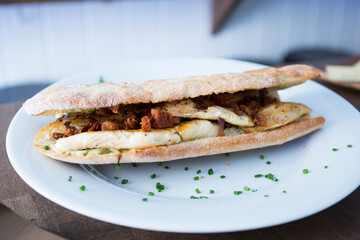 Delicious sandwich with chicken and salad.