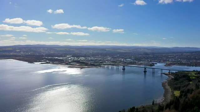 Sunny aerial shot of Inverness and Kessock Bridge, Scotland